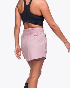 It has pockets. Nine pockets, to be exact. The Mizi Hike Skirt frees you up with stretchy-soft grid jersey for full range of motion, a built-in short liner and so much storage you might be tempted to ditch your pack. Why settle for less, when you can have both performance and style? | Features. Power mesh waistband pockets. Large front zip pockets. Soft, moisture-wicking liner short. Phone-friendly power mesh pockets in liner.. 4-way Stretch Mini Skirt For Workout, Running In Cold Weather, Running Race, Gym Training, Range Of Motion, Short Jacket, Tight Leggings, Best Sellers, Vest Jacket