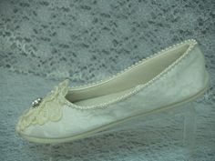 Ivory flat Vegan shoes amazingly comfortable, you'll feel as walking on clouds; elegantly decorated with hand STITCHED pearls around the edging, and overlayed with lace over satin. Shoes are safe for indoors and outdoors wear, Inside is fully padded, outer soles are safe non- slip man made material. This shoes are great for a super comfortable celebration (fully padded), or to have as the back up shoes for the brides aching feet after long time wearing heels. SIZE: 5 READY TO SHIP sale regular p Elegant Beige Flats For Wedding, White Slip-on Wedding Shoes, Cream Closed Toe Formal Flats, Formal Cream Closed Toe Flats, Elegant Cream Flat Wedding Shoes, Elegant Closed Toe Flats For Ceremony, Beige Round Toe Flats For Wedding, White Almond Toe Flats For Wedding, White Round Toe Flats For Wedding