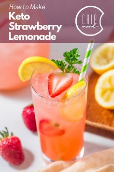 a drink with strawberries and lemons on the side