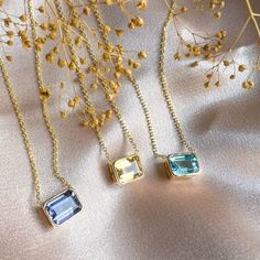 Beautiful collection East and West emerald cut Necklace. Handcrafted in New York. 14K Yellow Gold Yellow Citrine 8x6mm 1.75Ct Blue Topaz 8x6mm 1.75Ct Iolite 8x6mm 1.75Ct 18" Long adjustable to 16" Emerald Cut Necklace, Teapot Necklace, Blue Gemstone Necklace, Light Blue Sapphire, Gold Topaz, Citrine Jewelry, Solitaire Necklace, Topaz Jewelry, Citrine Necklace