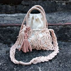 Mini bag in macrame technique.   3 colors to choose from: white, black, beige. Material: Polyester cord.   Inside 100% cotton cover (10.2 in * 9 in /26 cm * 23 cm)  Tassel decoration is removable.   Convenient long handle for carrying the string bag over your shoulder. Mini bag will hold everything you need. ___________________________ Instagram: @bags_by_vershy Bag Macrame, Tassel Decoration, Eco Friendly Bags, Handbag For Women, Mini Handbag, Macrame Bag, Net Bag, String Bag, Women Beach