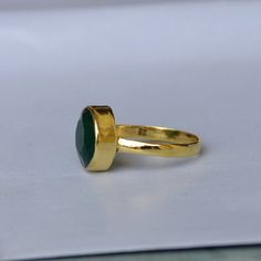 Natural Emerald Gold Ring-9K,14K,18K,22K Solid Gold Rings-Natural Gemstone Gold Ring -Gold Wedding Ring -Yellow Gold Ring-Birthstone Ring Available in 9K,14k,18K,22K yellow solid gold bezel and solid yellow gold ring are both shined to an extremely high polish. But if you prefer it in matte convo me after purchasing. The main stone is natural Emerald Gemstone. The pictures have been enlarged to show the details. The band is about 2 mm wide and 1 mm thick. This ring is made to order in your size. Gold Emerald Ring As Gift, Gold Emerald Ring With Round Stone, Gold Gemstone Ring For May Birthstone, Gold Rings With May Birthstone Gemstone, Oval Gold Emerald Ring With Stone Setting, Gold Emerald Ring For May Birthstone In Round Shape, Gold Emerald Ring With Stone Setting, Gold Sapphire Ring With Stone Setting, Yellow Gold Emerald Ring With Stone Setting For Wedding