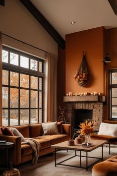 a living room filled with furniture and a fire place in front of a window next to a fireplace