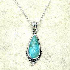 Discover the perfect blend of sophistication and bohemian charm with our Sterling Silver Turquoise Teardrop Pendant--a piece destined to become the centerpiece of your jewelry collection. Handcrafted with meticulous attention to detail, this pendant features a vibrant turquoise stone, renowned for its deep connection to tranquility and protection. Encased in a sterling silver teardrop frame, the gemstone exudes a serene beauty that captivates the eye and soothes the soul. Let this exquisite pendant be a testament to your refined taste and a reflection of your inner grace. With its enchanting color and timeless design, the Sterling Silver Turquoise Teardrop Pendant is more than just an accessory; it's a keepsake to be cherished for years to come. Measuring approximately 0.45 inches in width Bohemian Teardrop Necklace With Oxidized Finish, Bohemian Teardrop Necklaces With Oxidized Finish, Bohemian Oxidized Teardrop Necklaces, Bohemian Sterling Silver Teardrop Pendant Necklace, Bohemian Teardrop Sterling Silver Drop Necklace, Deep Connection, Teardrop Pendant, Elegant Jewelry, Silver Turquoise