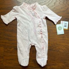 New With Tags! Sweet Pink Footed Bodysuit Made By Little Me. Newborn Sized With Rose Embroidery And Lovely Ruffles. No Imperfections. Spring Ruffled Onesie For Loungewear, Spring Loungewear Onesie With Ruffles, Fitted Long Sleeve Onesie With Ruffles, Fitted Long-sleeved Onesie With Ruffles, Newborn Gown, Rose Embroidery, Ruffles, Im Not Perfect, One Piece