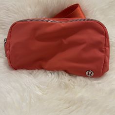 Lululemon Casual Rectangular Bag, Casual Lululemon Bags For Daily Use, Sporty Lululemon Nylon Bags, Sporty Lululemon Travel Bag, Casual Rectangular Lululemon Bag, Casual Nylon Lululemon Bags, Casual Lululemon Bag With Cell Phone Pocket, Casual Sports Bag With Zipper Pouch, Lululemon Everywhere Belt Bag