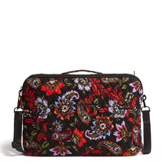 Carry your laptop effortlessly with this hands-free crossbody. Details: Exterior features a zip pocket. Retractable handle. Accommodates up to a 15" laptop. Zip closure. Care Tips: Remove strap before laundering; machine wash cold, gentle cycle, only non-chlorine bleach when needed; line dry Vera Bradley began as an instinct. We create bold, thoughtfully designed pieces that enrich everyday movement and mark life’s meaningful occasions. We design for you because Vera Bradley is you, and you are Travel Collection, Vera Bradley Bags, Travel Gear, Care Tips, Hands Free, Travel Luggage, Laptop Bag, Luggage Bags, Vera Bradley