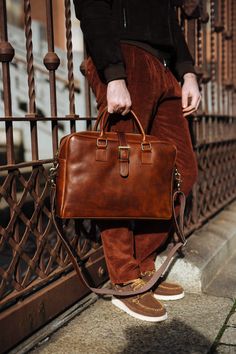 "This brown cowhide leather Briedfcase is 100% handmade. Our briefcase created especially for a person who is looking for a stylish but also functional bag. It's perfect at work and for everyday urban life. You can carry all your stuff, mobile phone and iPad perfectly organized. it has some inner pockets and 2 outter. the cross body strap is adjustable. like all of my shop's product, this bag is also design and made by Alma Milano. and it's 100% handmade Dimentions: -height :28 Cm / 11'' - Width Rectangular Oiled Leather Briefcase For Daily Use, Everyday Bridle Leather Rectangular Briefcase, Everyday Bridle Leather Briefcase, Leather Briefcase With Luggage Sleeve In Cognac, Cognac Leather Briefcase With Luggage Sleeve, Brown Bridle Leather Satchel Briefcase, Leather Rectangular Briefcase, Daily Use Bridle Leather Briefcase With Leather Backing, Brown Bridle Leather Briefcase With Smooth Grain