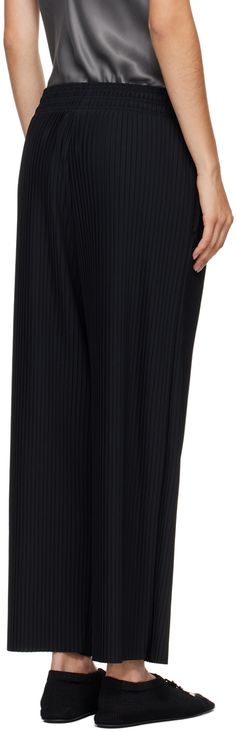 Garment-pleated stretch polyester crepe pants. · Elasticized waistband · Two-pocket styling Supplier color: Black Black Pleated Bottoms For Workwear, Black Pleated Pants For Work, Black Pleated Wide Leg Pants For Work, Chic Black Bottoms With Accordion Pleats, Elegant Black Bottoms With Accordion Pleats, Black Pleated Bottoms For Business Casual, Black Bottoms With Pleated Waist For Evening, Formal Black Bottoms With Accordion Pleats, Black Pleated Full-length Pants