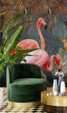 a living room with a green velvet chair and pink flamingo wall mural in the background