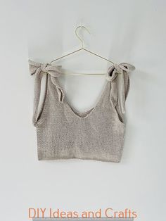 a crop top hanging on a hanger with the words diy ideas and crafts above it