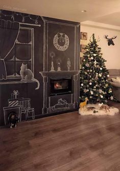 a living room with a christmas tree and chalk drawing on the wall next to a fireplace