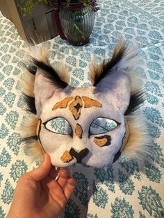 Hi this will only be up for 3 more days This is a calico/orange cat mask mix! (psst! it's half airbrushed and half hand painted! also it has bendable ears!) ~materials~ -felt -hot glue -acrylic paint -wire -eva foam -paper cat mask *made in household with dog* Halloween Cosplay Cat Design Mask, Cat Ears Masks With Whiskers For Masquerade, Halloween Cat Ears Mask With Whiskers, Masquerade Cat Ears Mask With Whiskers, Cosplay Cat Design Mask, Halloween Cosplay Hand Painted Masks, Halloween Masquerade Masks With Whiskers, Foam Paper, Paper Cat