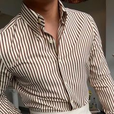 Presenting our Italy Striped Shirt, the pinnacle of style and refinement made especially for guys who value quality over quantity. This shirt is made for formal and business settings and captures the appeal of Old Money with an unmistakable Italian flair.The Italy Striped Shirt has a comfortable yet stylish fit and is made from a high-quality polyester and cotton blend. It adapts to your body in a graceful way while still allowing for flexibility and freedom of motion. This ground-breaking mixtu Business Casual Shirts, Quality Over Quantity, Ground Breaking, Formal Shirt, Men Trousers, Old Money Style, Create Shirts, Striped Long Sleeve Shirt, Striped Polo Shirt