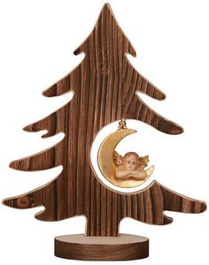 a wooden christmas tree with a baby in the moon hanging from it's side