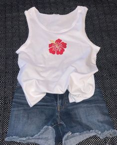 Stay cool in this hibiscus flower sleeveless top. Great to wear during the sunny days... available in small , medium, and large. Flower Shirts Aesthetic, Hibiscus Flower Swimsuit, Hibiscus T Shirt, Embroidered Hibiscus Flower, Hibiscus Flower Outfit, Summer Embroidered Cotton Tank Top, Summer Cotton Embroidered Tank Top, Hibiscus Print Clothes, Hibiscus Flower Shirt