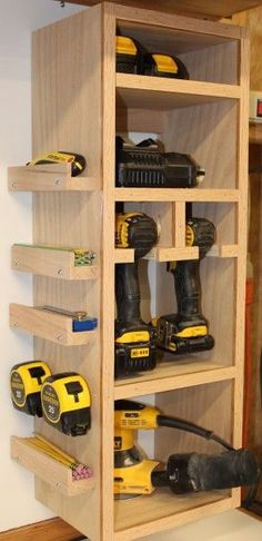 a wooden shelf filled with lots of tools