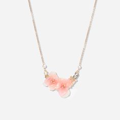 a necklace with pink flowers on it