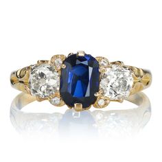 an antique sapphire and diamond three stone ring