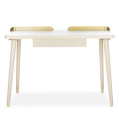 a white desk with two gold handles on it's legs and a drawer at the top