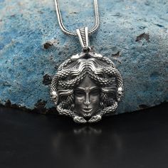 Medusa Silver Necklace, Ancient Greek Mythology Gorgon Medusa Necklace , 925 Sterling Silver Necklace, Handmade Necklace ✦ Details ✦ * Material: 925 Sterling Silver * Weight of pendant : 11.50   gram *  Chain Weight :     22 Inches = 5.60 Gr     24 Inches = 6.05 Gr     26 Inches = 6.10 Gr     28 Inches = 6,40 Gr * Sides oxidized * Stamp: 925 ✦ Shipping ✦ * Processing time: 1-3 business days. * This item ships from my Turkish workshop in Istanbul. * Add your phone number in address box for a smoo Antique Silver Sterling Silver Necklace Stamped 925, Symbolic Round Pendant Necklace, Symbolic Sterling Silver Necklace Stamped 925, Symbolic Antique Silver Necklace Stamped 925, Symbolic Necklaces With Silver Chain And Round Pendant, Symbolic Necklace With Silver Chain And Round Pendant, Symbolic Silver Pendant Necklace, Symbolic Round Necklaces Stamped 925, Symbolic Necklaces With Round Silver Pendant