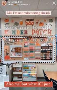 an office cubicle with a bulletin board on the wall