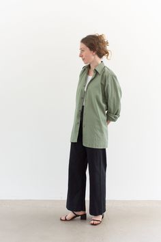 "Sage green shirt with button closure, pointed collar, buttons at cuff. The color is the loveliest sage.  Maker: Military  |  Material: feels like cotton poly blend. a bit of sheen.  Condition: Excellent. Deadstock. SMALL-MEDIUM:  Shoulders: 17\"  |  Chest: 21\"  |  Length: 29\"  |  Sleeve: 23.5\" Elizabeth is 5'5\" and wears Small in tops.  SHOP http://www.rawsonstudio.etsy.com FOLLOW US + instagram | @_rawson + pinterest | rawson *No Returns. Items are eligible for store credit only. We ask th Simple Button Up Outfit, Collared Olive Shirt With Button Closure, Olive Collared Shirt With Button Closure, Classic Green Shirt For Work, Everyday Khaki Shirt With Buttons, Green Blouse With Button Cuffs And Spread Collar, Green Blouse With Button Cuffs For Work, Everyday Khaki Shirt, Green Spread Collar Top For Work