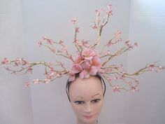 *  This is a statement piece and walk into any event and heads will turn.  This gold branch fascinator has been covered in feminine pink flowers with a center of Alstroemeria a delicate and soft looking flower. *   It is light weight, evenly balanced and comfortable to wear designed on an acrylic headband.   *  Bold for the gal who wants to be noticed. *  Great for a adventurous spirit it would be great for Derby Events & Celebrations, Weddings, High Tea, Fashion Show, Garden Party, Ladies Lunch Pink Party Headpiece With Flower Decoration, Adjustable Gold Headpiece For Spring, Whimsical Evening Headpieces For Spring, Spring Flower-shaped Fitted Fascinator, Spring Flower Fascinator, Spring Evening Headpiece With Structured Crown, Structured Crown Headpiece For Spring Evening, Evening Headpiece With Structured Crown For Spring, Pink Headpiece With Handmade Flowers For Spring