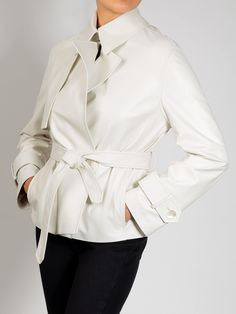 Simplicity and elegance in a single Daisy Italian Lambskin Leather Jacket. An iconic heritage piece is given a contemporary touch, ready to wear in all seasons. With a tailored but relaxed cut, it manages to accentuate the waist with a belt. Designer Formal Outerwear With Belt, Luxury Fitted Outerwear With Belt Loops, Luxury Formal Blazer With Belted Cuffs, Classic Fitted Outerwear With Belt Detail, Luxury Belted Business Blazer, Luxury Long Sleeve Belted Blazer, Luxury Tailored Belted Blazer, Luxury Blazer With Belted Cuffs For Office, Luxury Office Blazer With Belted Cuffs