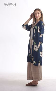 "Long kimono jacket is so versatile You can throw over any casual outfit to bikinis on the beach It is made of light floral fabric with inseam pockets This boho kimono robe is designed to be loose fit with drop shoulder It hangs effortlessly on your body Create casual cool style with this pretty bohemian robe -Made of light poly cotton fabric ( it does not wrinkle easily ) -Loose fit -Inseam pocket -Open front. Ties waist -Three quarter sleeves Is your measurements off sizes? Please ask us about Inseam Pocket, Long Kimono Jacket, Bohemian Robes, Kimono Wrap, San Ramon, Festival Clothing, Boho Kimono, Long Kimono, Kimono Cardigan