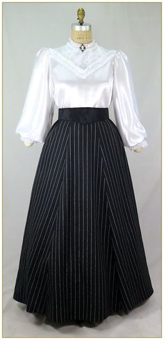 "Linen/Cotton. Color: Black and white. Medium weight yarn dyed pinstripe black and white stripe linen blend woven fabric with a graceful drape. Victorian style skirt cut in 3 gore style for the silhouette of the period. Comfortable matching black and white stripe elastic waistband. Total circumference approx. 94\"' at hemline. Wide variety of sizes and lengths. Dry clean. Circa 1890-1905. Made in U.S.A. Sizes: SM, MED, LG, XLG & 2XLG. Size Assistance for Elastic Waist Skirt: SM fits up to 26\" w Diy Victorian Dress, Elegant Striped Relaxed Skirt, Striped Pleated Fitted Skirt, Elegant Fitted Striped Skirt, Fitted Black Skirt With Vertical Stripes, Fitted Pinstripe Skirt For Work, Drow Fashion, Matilda Vibes, Victorian Era Outfits