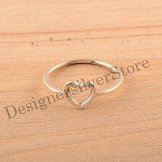 About item Item :- Heart Ring Ring size :- Chose from variation (Custom size accepted) Material  :- 925 Sterling silver Purity  :- 92.5 Title:- Love Heart Ring, Heart shaped ring, Heart Hand Rings, Open Heart Jewelry, Simple Heart Ring, Romantic Rings, Charming Ring, Dainty Gold Heart Ring, Promise Ring, Christmas Gift, Rings For Women Description:- We use 925 sterling silver to making jewelry. We accept all types of custom & personalized order. Please send us a message if you are interested in a custom creation. Shipping profile:- We ship all order within 3-5 days. But custom order takes time. Customer service :- If you have any question about our products & services, feel free to contact us. We do always best for our customers Other Specification:- Please Visit Our Shop home page to view Valentine's Day Gift Stackable Rings, Dainty Silver Heart Ring For Proposal, Sterling Silver Heart Ring For Valentine's Day Proposal, Gold Sterling Silver Heart Ring For Valentine's Day, Gold Heart-shaped Stackable Rings For Valentine's Day, Heart-shaped Rose Gold Midi Rings As Gift, Silver Heart Ring For Proposal On Valentine's Day, Minimalist Heart Ring For Wedding And Mother's Day, Rose Gold Open Heart Wedding Ring