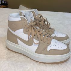 Air Jordan 1 Elevate High Women’s Size 10 Never Worn!!! So Cute And So Comfortable. Zip Side For Easy On/Off. Perfect Fall/Winter Neutral Shoe Nike Casual High-top Platform Sneakers, Nike White Platform Sneakers With Gum Sole, Casual White Jordan Shoes With Gum Sole, Nike Beige High-top Sneakers, Beige Nike High-top Sneakers, Cream Sneakers With White Laces For Streetwear, Nike Cream High-top Sneakers, Nike Cream High-top Sneakers With Cushioned Footbed, Nike High-top Platform Sneakers With Cushioned Footbed