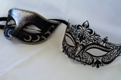 This is a gorgeous combination for his and hers masquerade masks. One is Silver and black which we put a dash of black glitter and silver around the eyes also sealed it with a beautiful silver trim! Part of the pair is beautiful laser cut metal mask with beautiful crystals and a black ribbon. I will combine a his and hers mask from any of my masquerade masks that fit both! I can combine my machine embroidered masks too that I make and change any color of my machine embroidered masquerade masks. Black Masquerade Mask For Wedding Carnival, Silver Formal Masquerade Mask For Carnival, Elegant Silver Masks For Halloween, Silver Gothic Eye Masquerade Mask, Gothic Silver Eye Masquerade Mask, Silver Gothic Eye Mask For Masquerade, Silver Gothic Masquerade Mask For Carnival, Silver Fantasy Masks And Prosthetics For Party, Gothic Silver Masquerade Mask For Party