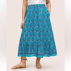 Body Bust: 40.2-42.1" Waist: 33.9-36" Hips: 44.1-46.1" Product Length: 34.8" Casual Tiered Skirt With Buttons, Casual Tiered Skirt With Button Closure, Casual Flowy Turquoise Skirt, Casual Button Skirt For Vacation, Blue Button-up Summer Skirt, Casual Beach Skirt With Button Closure, Blue Button-up Casual Skirt, Bohemian Summer Bottoms With Button Closure, Bohemian Bottoms With Button Closure For Summer