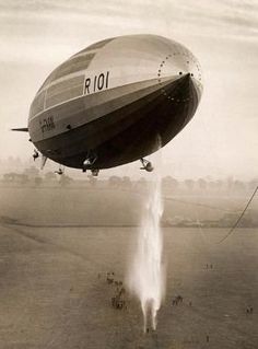 an old black and white photo of a large air balloon