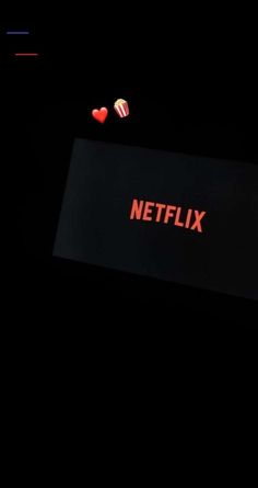 the netflix logo is shown on a black background with red letters and hearts floating around it