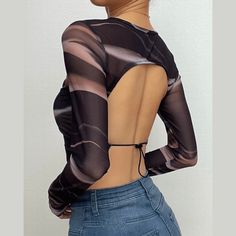 Please refer to our sizing chart for a guideline when choosing a size. 5 business days order processing time. 90% polyester 10% spandex. Non-stretch Long Sleeve Crop Top For Night Out, Summer Fitted Crop Top With Sheer Sleeves, Fitted Crop Top With Sheer Sleeves For Summer, Spring Crop Top With Mesh Back And Stretch, Stretch Crop Top With Sheer Sleeves For Spring, Trendy High Stretch Mesh Top For Party, High Stretch Trendy Mesh Top For Party, Trendy High-stretch Mesh Top For Party, Chic Fitted Mesh Crop Top