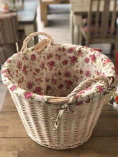 a wicker basket sitting on top of a wooden table