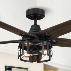 a ceiling fan with three lights in a room