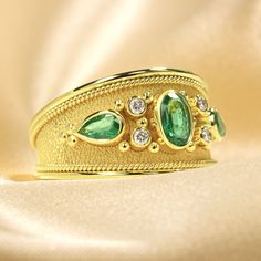 Make an unforgettable entrance with this dazzling gold Emerald Ring - encrusted with dazzling diamonds and fit for royalty! It's the perfect pick to add extravagant style and sparkle to your wardrobe and make an undeniable statement! 100% handmade in our workshop. Metal: 14K Gold| 18K Gold Gemstones: Emeralds | weight 0,68 ct Diamonds | weight 0,08 ct Discover the art of personalization as you select your dream jewelry, choosing the perfect gemstone that resonates with your unique style. Our ded Glamorous Gold Open Ring Jewelry, Luxury Gold Rings With Diamond Accents, Luxury Gold Diamond Ring With Rose Cut, Luxury Gold Diamond Ring With Rose Cut Diamonds, Glamorous Gold Rings With Diamond Accents, Luxury Gold Diamond Ring With Accents, Luxury Gold Diamond Ring With Diamond Accents, Party Gold Diamond Ring With Sparkling Stones, Gold Diamond Ring With Sparkling Stones For Party