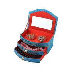 an open jewelry box filled with lots of beads