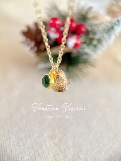 💜14K Gold Jingle Bell Pendant Necklace For Christmas Gift Add a touch of holiday magic to your ensemble with our 14K Gold Jingle Bell Pendant Necklace featuring a sparkling green crystal bead. This festive necklace is the perfect accessory for Christmas, capturing the spirit of the season with its whimsical jingle bell charm. Whether it's a gift for a loved one or a delightful addition to your own jewelry collection, this necklace is a cheerful reminder of the joy and merriment of the Christmas Personalized Christmas Jewelry For Holidays, Personalized Christmas Holiday Jewelry, Green Jewelry For New Year's Gift, Green Jewelry For New Year Gift, Green Holiday Jewelry Gift, Green Jewelry As A New Year Gift, Christmas Holiday Green Jewelry, Holiday Gift Green Jewelry, Green Christmas Holiday Jewelry