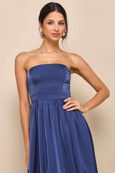 You'll look fabulous in an instant with a effortlessly sleek look like the Lulus Lavish Elegance Navy Blue Satin Strapless Bubble-Hem Midi Dress! Luxe stretchy satin shapes this lovely dress that has a strapless, princess-seamed bodice (with hidden no-slip strips and supportive side boning) and a straight neckline. A high, banded waist features long tying sashes that secure at the back, all atop a flowy, A-line skirt that cascades down to a chic midi, bubble-style hem. Hidden back zipper/clasp. Bubble Style, Blue Satin, Sleek Look, Lovely Dresses, A Line Skirts, Bodice, Navy Blue, Satin, Midi Dress