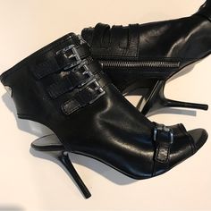 New Without Box Leather Open Toe Booties For Night Out, Leather Booties With Reinforced Heel For Night Out, Leather Open Toe Heeled Boots For Night Out, Open Toe Leather Booties For Night Out, Open Toe Boots With Buckle Closure For Night Out, Fall Formal Open Toe Booties, Edgy Leather High Heel Booties, Edgy High Heel Leather Booties, Michael Kors Black Open Toe Heels