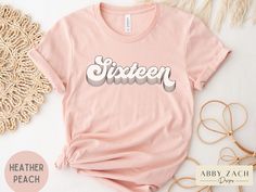 Celebrate your 16th birthday in style! This boho chic sixteen graphic tee is simple, trendy and on point. The soft style shirt is printed with a layered font in a beautiful color palette of cream, rose, blush, and champagne. This t-shirt pairs well with rose gold sweet sixteen party themes and decor. Printed on Bella Canvas brand shirts for ultimate comfort and softness. Celebrating a different birthday age? Visit my shop for listings of other milestone ages. https://www.etsy.com/shop/AbbyZachDe Trendy Birthday T-shirt For Spring, Trendy T-shirt For Spring Birthday, Trendy Screen Print T-shirt For Birthday, Rose Gold Birthday Party Ideas, Gold Birthday Party Ideas, Sweet Sixteen Party Themes, Rose Gold Birthday Party, Rose Gold Birthday, Birthday Girl T Shirt