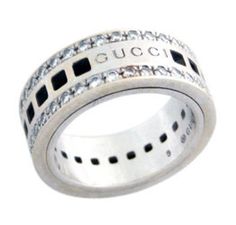 Gucci 18K White Gold and Diamond Ring containing 48brs. +/- .80ct.   Finger size 4 3/4. Item Number: 72266 Designer Diamond Ring With Pave Setting, Designer Brilliant Cut Rings, Designer Diamond Ring With Vvs Clarity, Designer White Gold Ring With Pave Setting, Designer Diamond Ring With Accents, Aaa Quality Diamond Classic Rings, Classic Diamond Rings Aaa Quality, Designer Ring With Pave Setting, Designer Round Diamond Ring Hallmarked