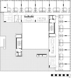 the floor plan for an office building, with several tables and chairs on each side