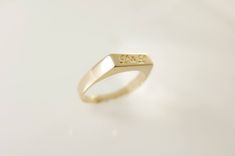 Gold name ring. Personalized name ring. Word ring. Name gold ring. gold name ring. signet ring. name initial ring 🌟 Rings info: The ring is made of : Metal base: Solid Gold 14k-White/ yellow. Brass- gold plated. Silver-gold plated. 2 or Up to 6 letters. If you want it in Hebrew Please write it in the note box. ⚠ Don't forget to write me the initials/name/word you wish for in the note box on the checkout page ⚠ The ring price is up to size 11. if you need larger,please convo me. All rings are pa Simple Gold Initial Ring For Anniversary, Simple Yellow Gold Initial Ring For Anniversary, Simple Anniversary Ring With Initials, Simple Anniversary Rings With Initials, Simple Engraved Yellow Gold Ring For Anniversary, Simple Yellow Gold Engraved Ring For Anniversary, Minimalist Signet Ring With Initials For Anniversary, Simple Gold Engraved Promise Ring, Simple Gold Engraved Ring For Anniversary