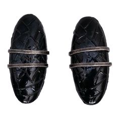 Yves Saint Laurent - Blackened metal earrings adorned with a black glass paste cabochon. Additional information: Condition: Very good condition Dimensions: Height: 4 cm (1.57 in) - Width: 2 cm (0.79 in) Seller Reference: BO39 Designer Black Clip-on Earrings, Designer Metal Clip-on Earrings For Formal Occasions, Designer Black Clip-on Jewelry, Designer Black Metal Jewelry, Evening Black Cabochon Earrings, Black Enamel Metal Earrings For Evening, Black Cabochon Earrings For Evening, Luxury Black Clip-on Earrings For Formal Occasions, Formal Black Enamel Metal Earrings